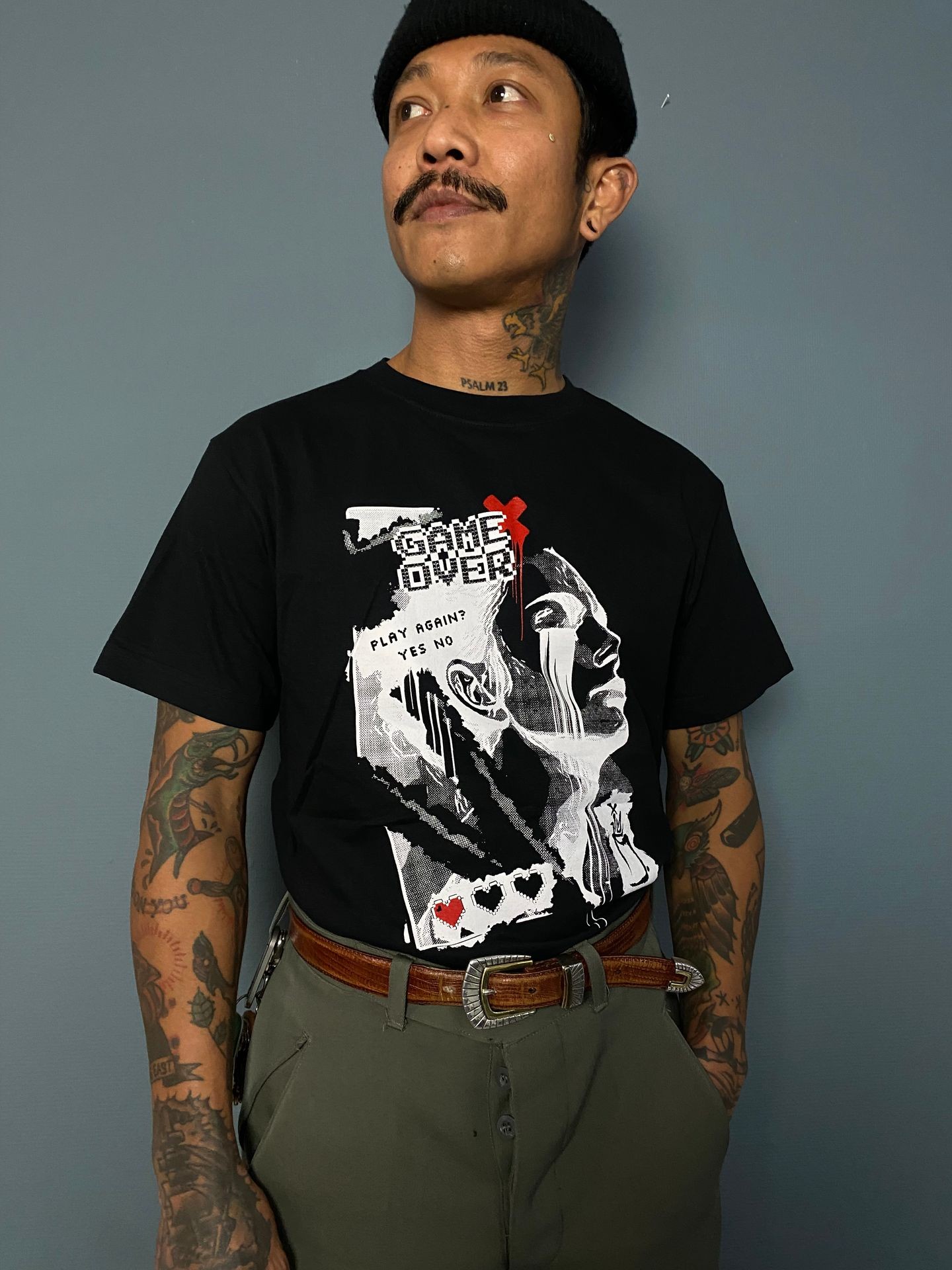 Man with cool t shirt game over 